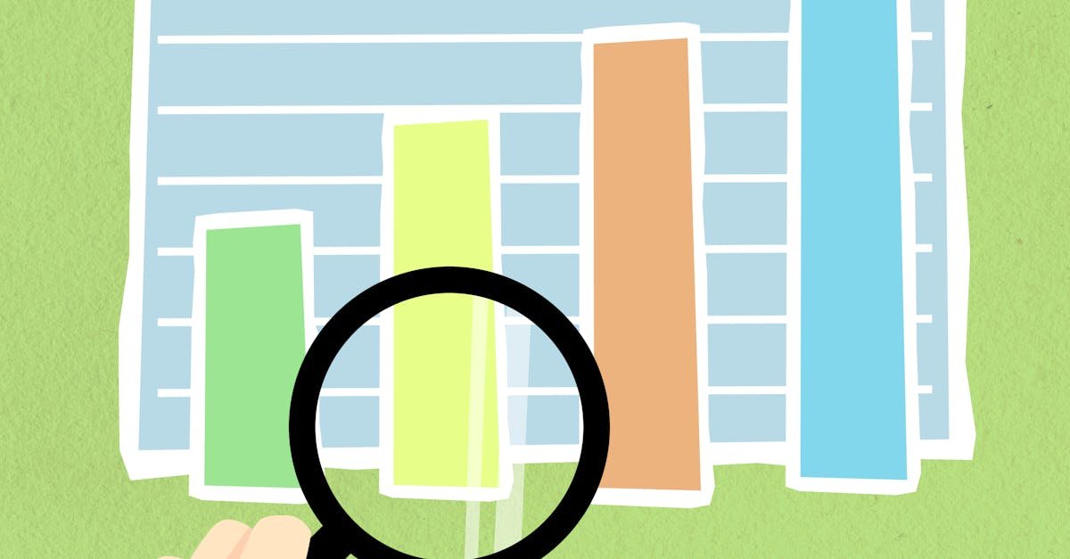 Top view of decorative cardboard illustration of hand with magnifying glass above diagram with columns on green background